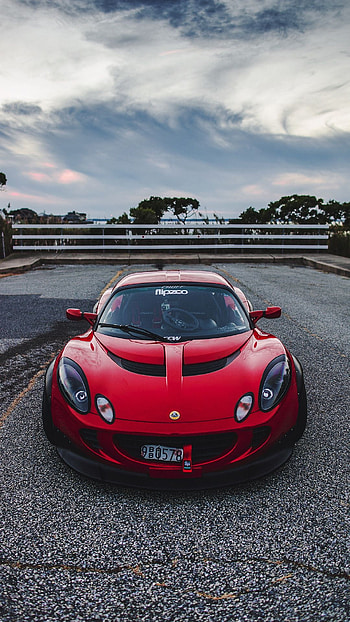 Lotus car, Automotive elegance, Timeless design, Unmatched performance HD phone wallpaper