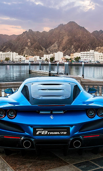 Blue sports car, Dynamic motion, Exhilarating drive, Attention-grabbing style HD phone wallpaper