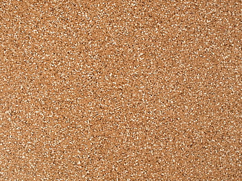 Close-up view of a granular sandstone surface texture, ideal for backgrounds. HD wallpaper