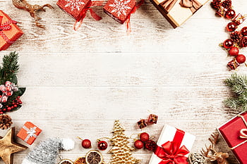 Flat lay of Christmas presents and decorations on wooden background. HD wallpaper