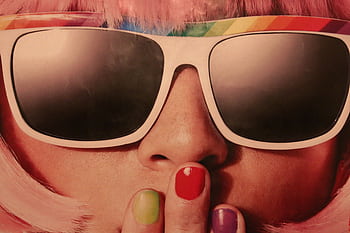 Fashionable woman with colorful sunglasses and nails in a retro style close-up. HD wallpaper