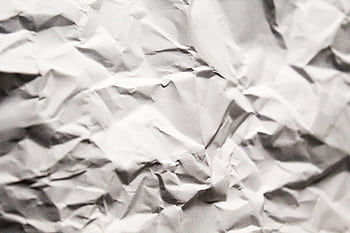 Close-up view of a crumpled paper texture, perfect as a background or . HD wallpaper