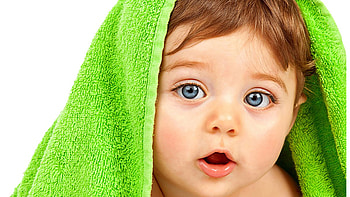 Closeup View Of Grey Eyes Cute Baby Under Green Towel Cloth In White Background Cute HD wallpaper