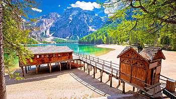 Lago di Braies turquoise water and Dolomites Alps view, dolomites, sky, italy, mountains, alps, cabin HD wallpaper