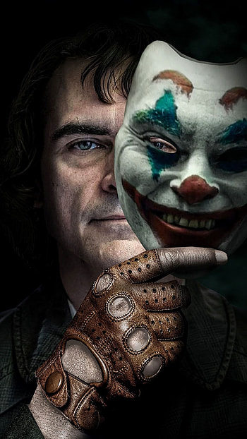 Joaquin Phoenix, Captivating portrayal, Joker character, Dark and brooding HD phone wallpaper