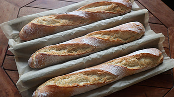 Authentic baguette, Crispy texture, Delectable flavors, French bakery HD wallpaper