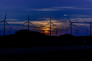 Sunset, wind mills, turbines, blue sky HD wallpaper