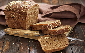 Freshly baked loaf, Warm crusty bread, Delicious aroma, Sliced perfection HD wallpaper