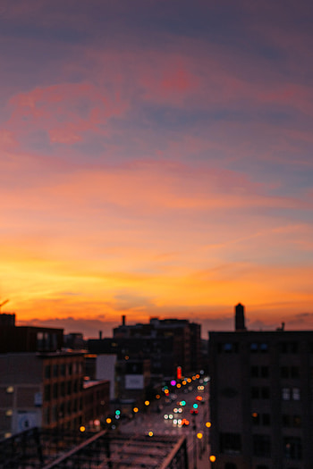 Sunset, City, Building, Glare, Miscellanea, Miscellaneous, Blur, Smooth HD phone wallpaper
