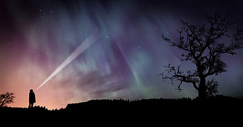 Northern lights, man with torch, sky, silhouette HD wallpaper