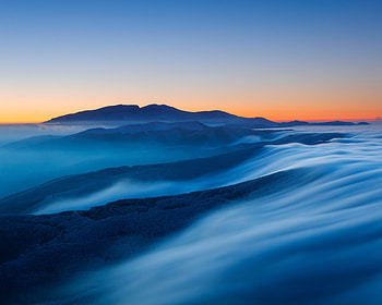 Sunset, mountains, fog, horizon, landscape HD wallpaper