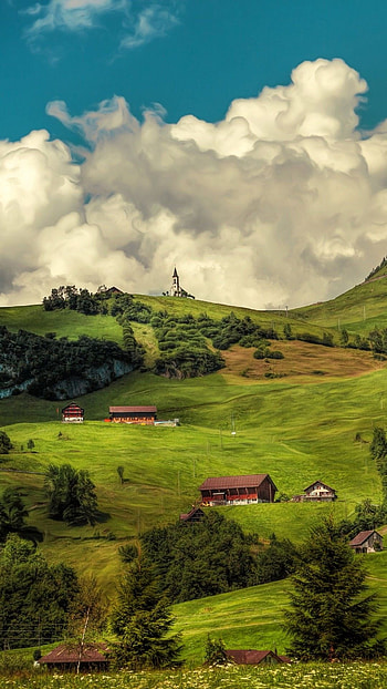 Swiss hill village, Enchanting forest, Cloudy atmosphere, Nature's backdrop HD phone wallpaper