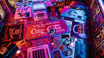 Colorful retro signage and vintage Americana decor in a captivating artistic layout with vibrant lighting. HD wallpaper