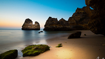 Green Algae Covered Stones On Beach Sand Rocks Ocean Water Under Blue Sky Nature HD wallpaper
