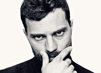 Jamie Dornan, white, black, man, actor, face, bw, hand HD wallpaper