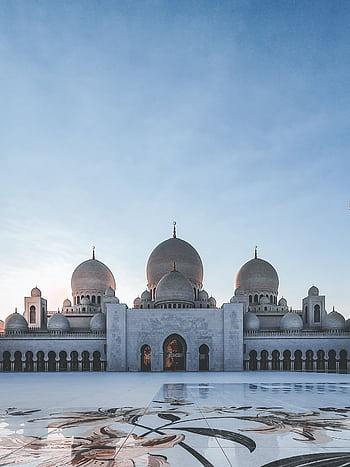 Stunning view of the iconic Sheikh Zayed Grand Mosque's domes at sunrise, Abu Dhabi. HD phone wallpaper