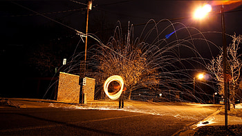 Juggling fire artistry, Fascinating visual spectacle, Skills in motion, Stunning performance HD wallpaper