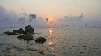 Big Stones On Ocean And Landscape View Of Buildings During Sunrise With Fog Nature HD wallpaper