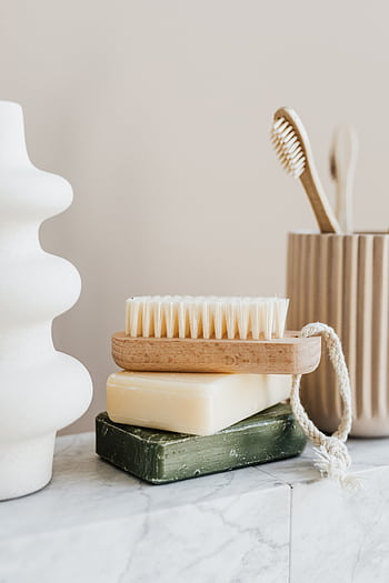 Aesthetic arrangement of sustainable bathroom items on marble surface. HD phone wallpaper