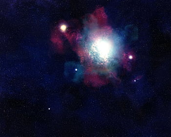 A stunning cosmic view highlighting vibrant nebulae and sparkling stars in deep space. HD wallpaper
