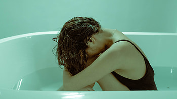 Sad Woman In Bath Tub HD wallpaper