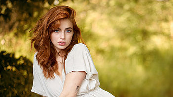 Blue Eyes Redhead Beautiful Girl Model Is Wearing White Dress Sitting In Green Blur Bokeh Background Girls HD wallpaper