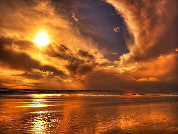 Swirls, orange sky, clouds, water, reflections, sunset HD wallpaper