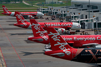 AirAsia flight incident, Malaysia travel news, On-board snake discovery, CNN report HD wallpaper