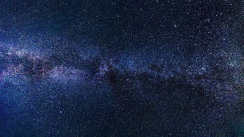 A breathtaking view of the starry night sky showcasing the Milky Way galaxy. Perfect for celestial themes. HD wallpaper