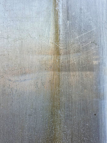Close-up of a rusted metal texture with a weathered surface and distinctive patterns. HD phone wallpaper