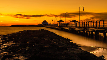 Pier Beach Rocks Sunset HD wallpaper