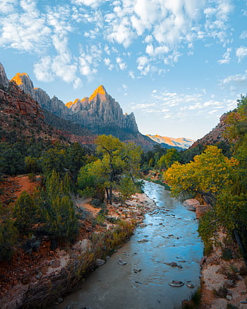 Majestic mountain landscape with a tranquil river in Zion National Park under a vibrant sky. HD phone wallpaper