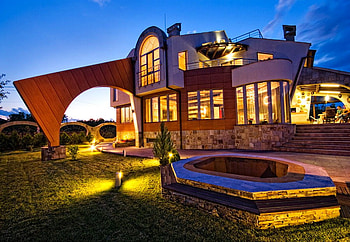 Stylish home, hot tub, garden lights, arches, patio, country, two story, brick and rock HD wallpaper