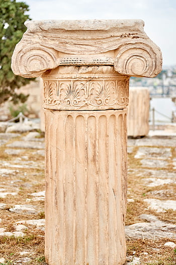 Close-up of an ancient Ionic column at the Acropolis in Athens, Greece. HD phone wallpaper