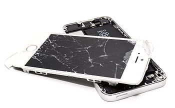 Close-up of a broken smart with a severely cracked screen. HD wallpaper