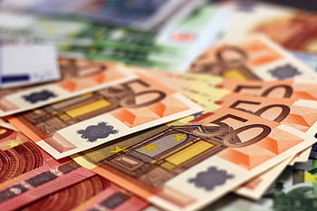 Stack of 50 euro banknotes, representing wealth and finance concepts. HD wallpaper