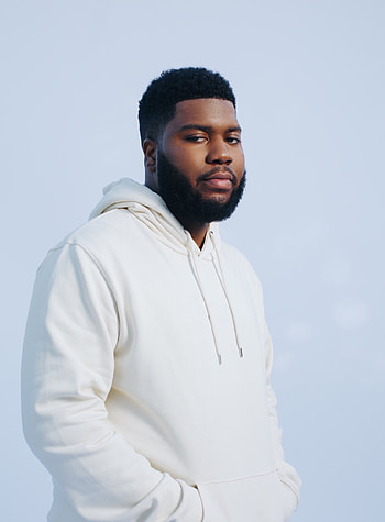 Khalid's essence, Captivating melody, Visual journey, Musical talent HD phone wallpaper