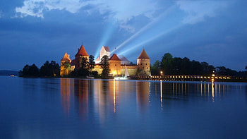 lights from trakai castle in lithuania, night, island, lights, clouds, castle HD wallpaper
