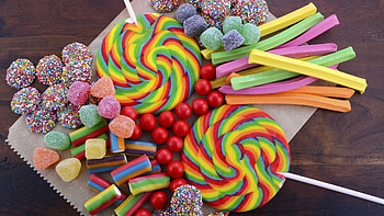 Colorful candies and sweets, Vibrant and enticing, Sweet and sugary, Eye-catching delight HD wallpaper