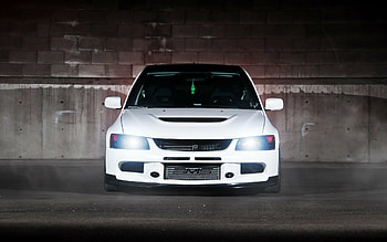 Mitsubishi Lancer Evolution IX, Legendary sports sedan, Unleashed power, Timeless design HD wallpaper