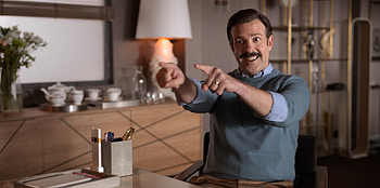 Ted Lasso magic, Unconventional coach, Hilarious moments, Refreshing comedy HD wallpaper