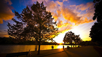 Twilight, clouds, trees, people, water, sunset HD wallpaper