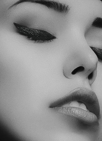 Artistic black and white close-up portrait of a woman's face with glamorous makeup. HD phone wallpaper