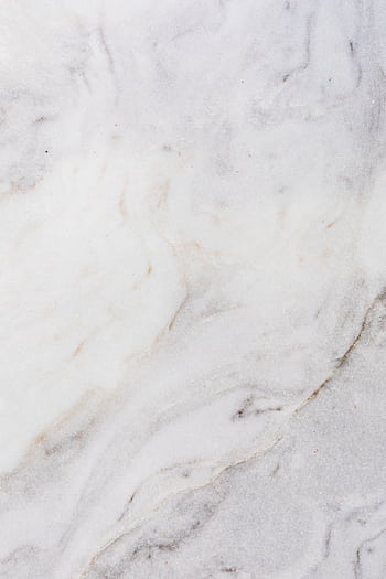 High-resolution white marble texture with natural patterns, ideal for design and architecture projects. HD phone wallpaper