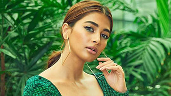 Beautiful Actress Pooja Hegde Is Wearing Green Glitter Dress Standing In Green Leaves Plants Background Girls HD wallpaper