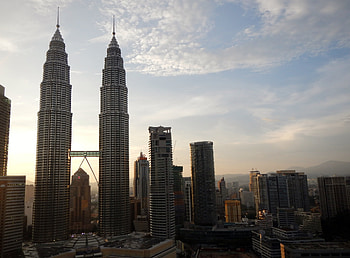 Petronas Twin Towers, Stunning urban view, Iconic structure, Kuala Lumpur HD wallpaper