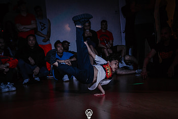 Boys breakdancing, Youthful energy, Dynamic dance moves, Passionate performance HD wallpaper
