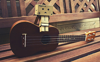 Ukulele tunes, Musical melodies, Strumming strings, Harmonious rhythms HD wallpaper