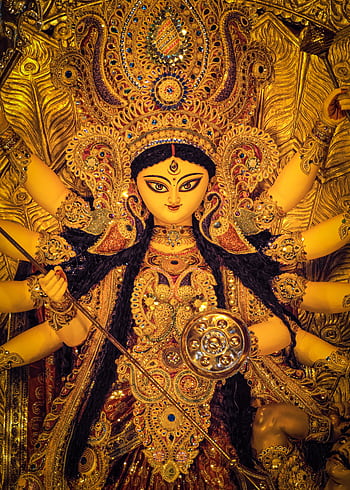 Exquisite Durga Puja idol showcasing rich cultural heritage in Kolkata, India HD phone wallpaper