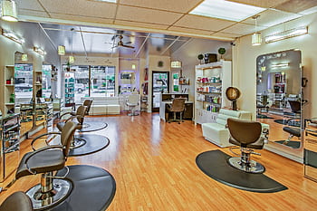 Spacious hair salon in Del Mar, California featuring contemporary design and ample seating. HD wallpaper